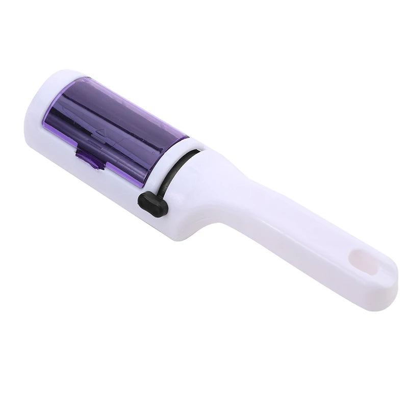 Brosse anti-poils électrostatique blanche à cylindre violet, vue de dessus