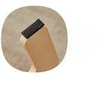 Nid suspendu en bois avec bande noire texturée sur le rebord