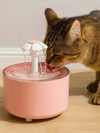Fontaine à eau automatique pour chat rose avec jet sortant du dôme transparent