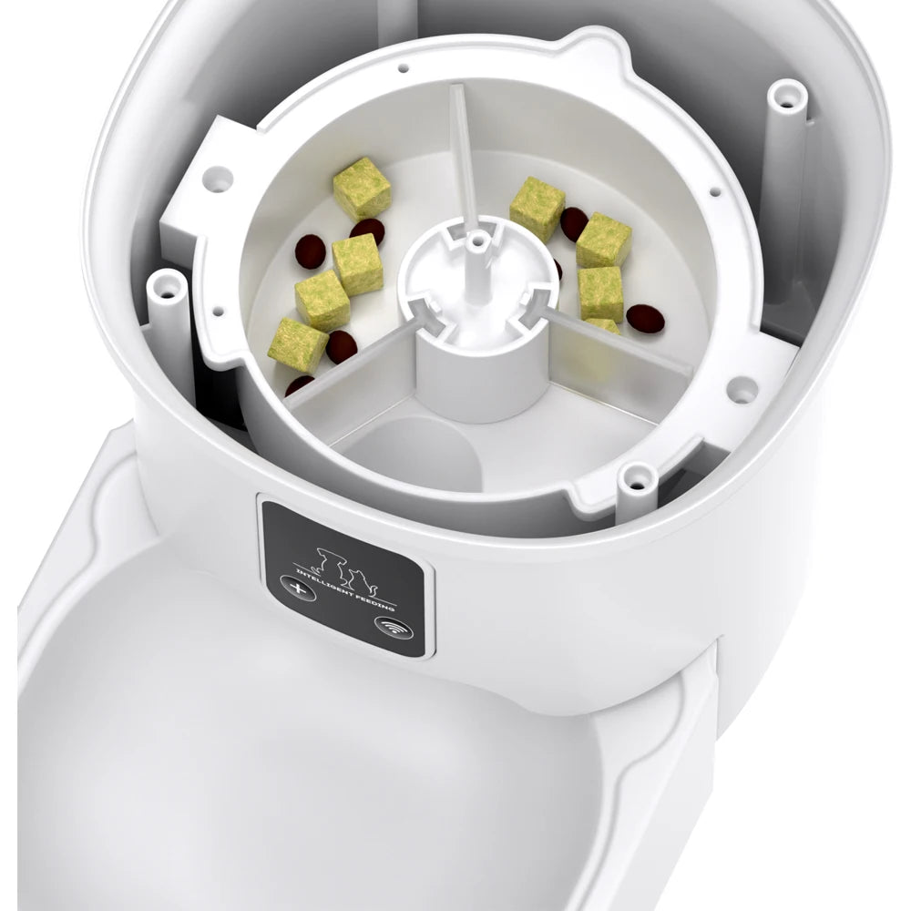 Intérieur du distributeur automatique blanc : compartiment rotatif et supports