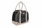 Sac de transport noir matelassé avec poches en maille, poignées blanches et fermeture zippée