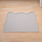 Tapis de repas en silicone gris, bords relevés, forme tête de chat