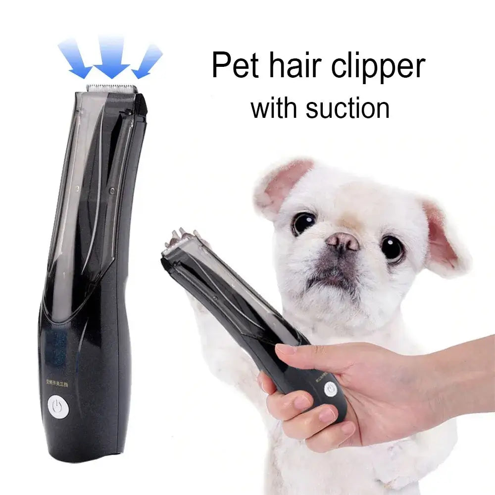 Tondeuse pour animaux noire avec système d’aspiration, tenue en main.